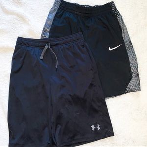 2 Pairs boys shorts size Large UA and Nike